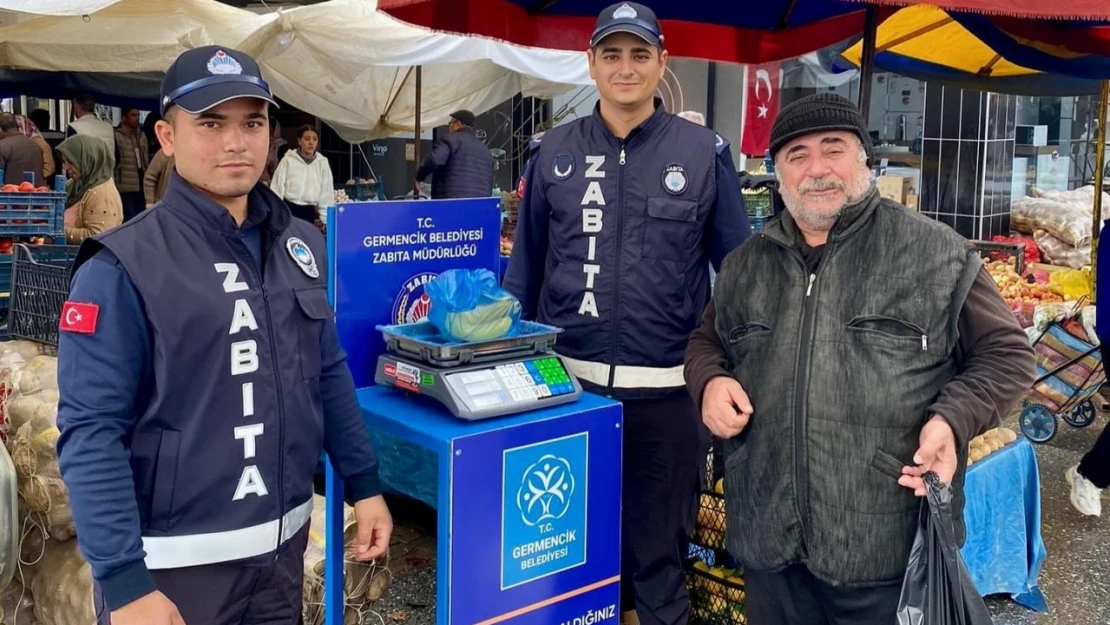 Germencik'te pazar yerlerinde başlatılan tartı uygulaması sürüyor