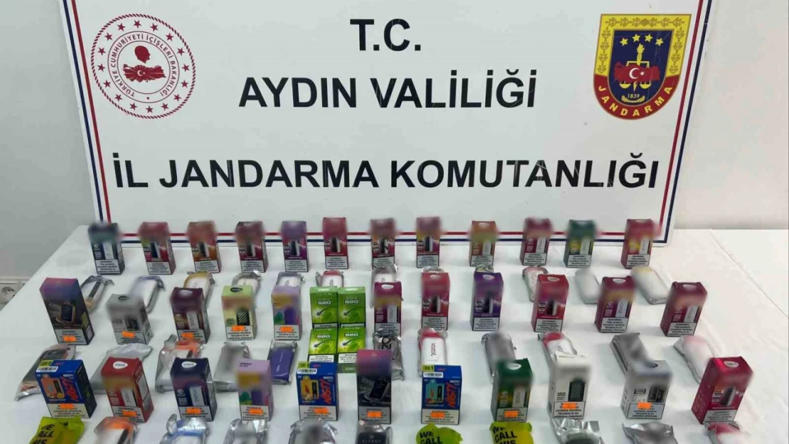 Kuşadası'nda sigara kaçakçılığı baskını: 2 gözaltı