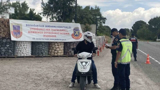 Bozdoğan'da motorculara kask dağıtıldı