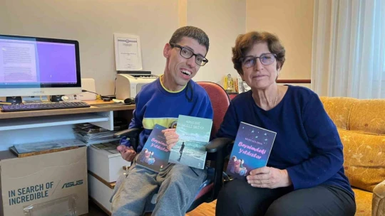 Ellerini kullanamayan Erol, burnuyla 328 sayfalık kitap yazdı