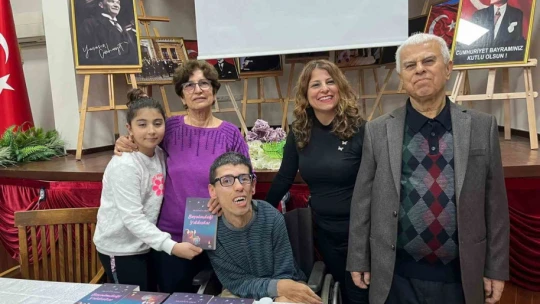 Ellerini kullanamayan Erol, burnuyla 328 sayfalık kitap yazdı