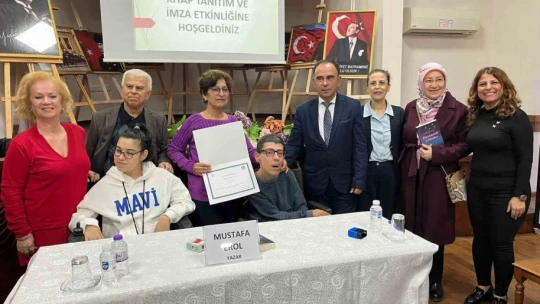 Ellerini kullanamayan Erol, burnuyla 328 sayfalık kitap yazdı