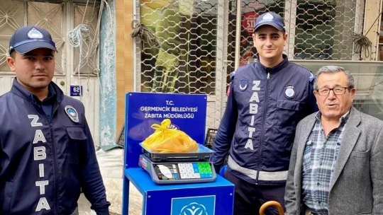 Germencik'te pazar yerlerinde başlatılan tartı uygulaması sürüyor