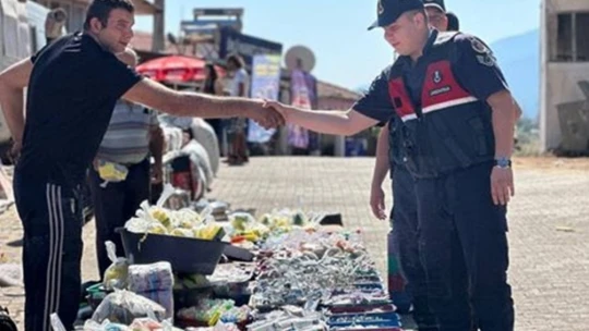 Karacasu jandarması vatandaşları sahte para ve dolandırıcılığa karşı bilgilendirdi