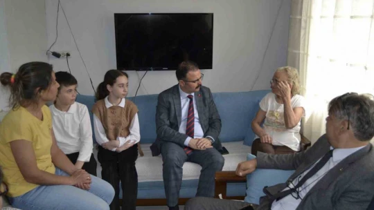 Kaymakam Ateş şehit ailelerine misafir oldu