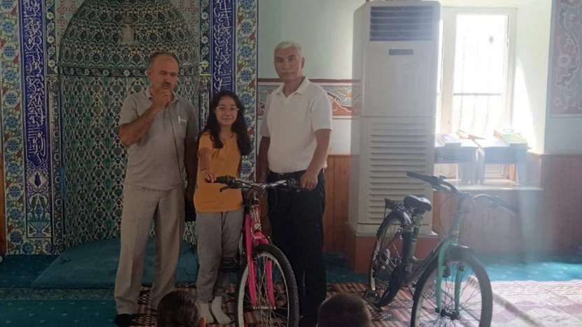 Çine'de Kur'an-ı Kerim'e geçen öğrencilere bisiklet hediye edildi